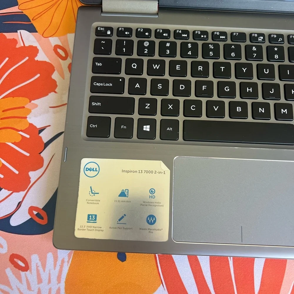Dell Inspiron 13 7000 2in1 laptop. Converts to tablet and is touchscreen.